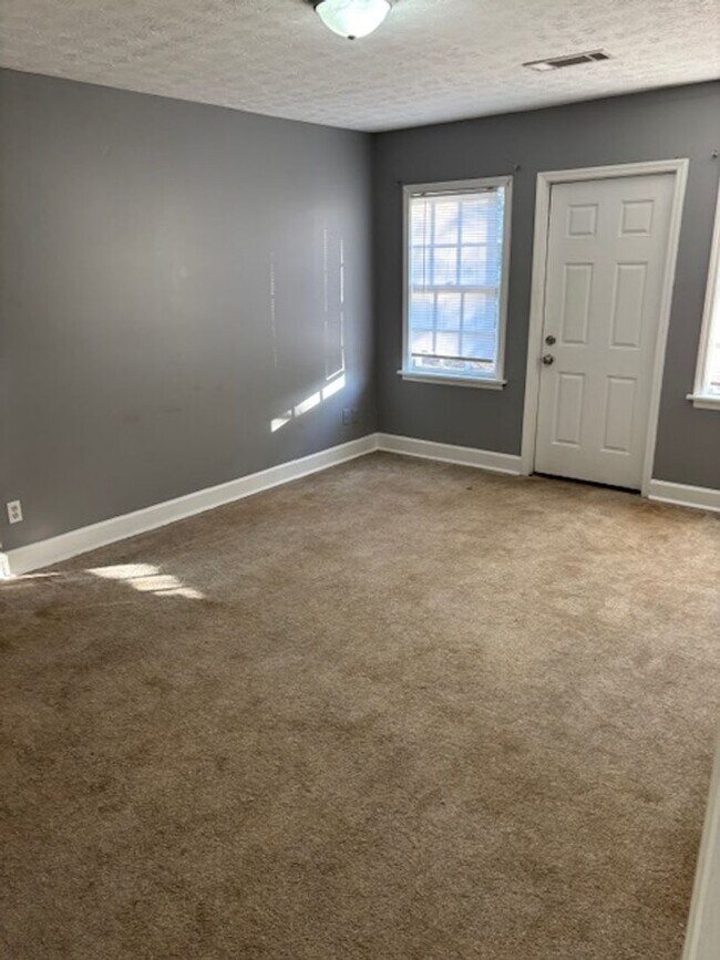 Building Photo - Where Style Meets Serenity — Your New Home Awaits