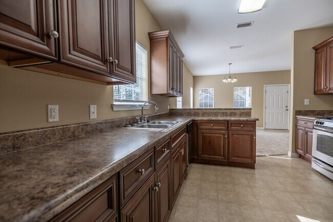 Building Photo - Now Available in Spanish Fort – Churchill Downs Community!