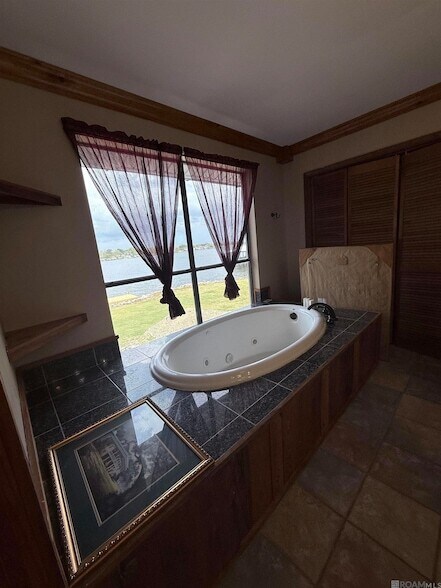 Building Photo - 8174 False River Rd