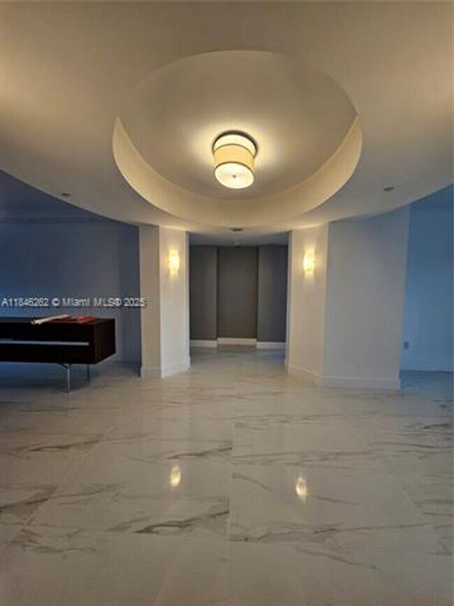 Building Photo - 19111 Collins Ave