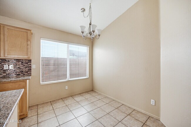 Building Photo - 4512 E Windsong Dr