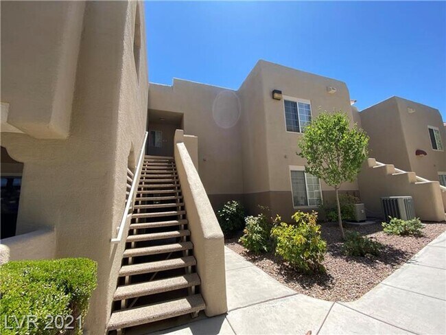 Building Photo - Cozy 1-Bed Condo in Gated 89128 Community ...
