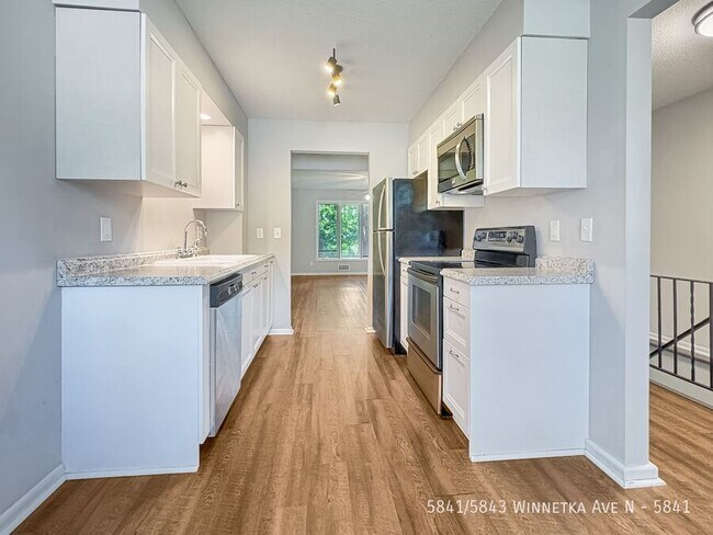 Building Photo - 5841/5843 Winnetka Ave N-5841