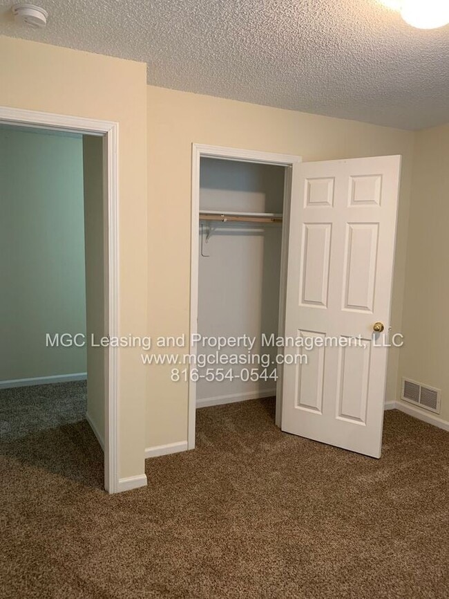 Building Photo - Welcome to Whispering Winds Townhomes – Wh...