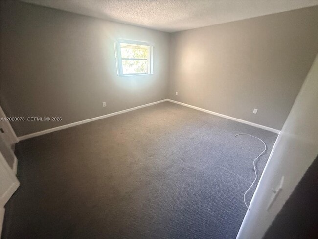 Building Photo - 10787 Royal Palm Blvd