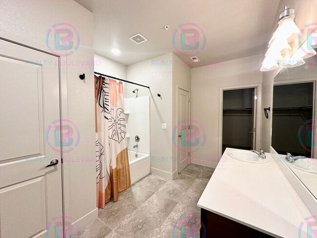 Building Photo - 1 Month Fee!-Specific. Modern Designer 2 Bedroom 2.5 Bathroom Townhome with Smart Features, Tesla...