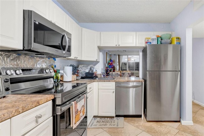 Building Photo - 3050 NW 42nd Ave