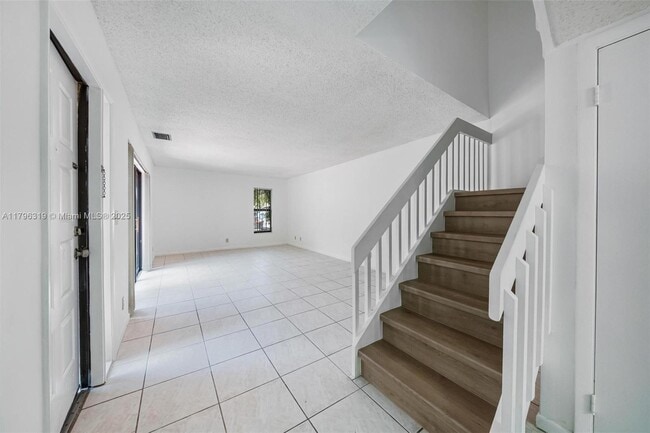 Building Photo - 3199 Cocoplum Cir
