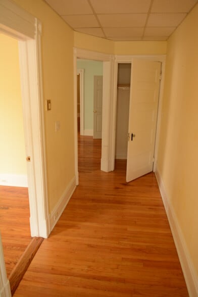 Hardwood throughout hallways, bedroom, living, and dining area - 675 Spring Garden St