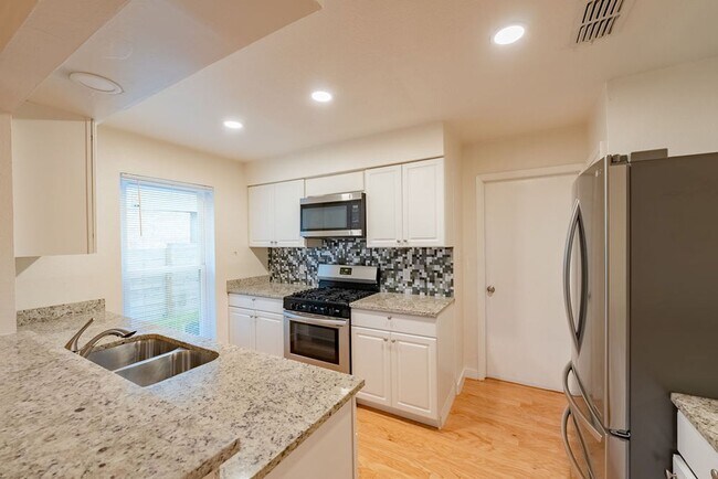 Building Photo - South Austin Sanctuary: Elevated Living, Urban Comfort, Premier Location