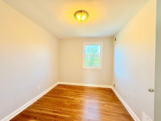 Building Photo - Charming Brick Home with Finished Basement, Modern Kitchen & Spacious Yard