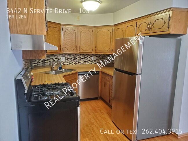 Building Photo - 8442 N Servite Dr