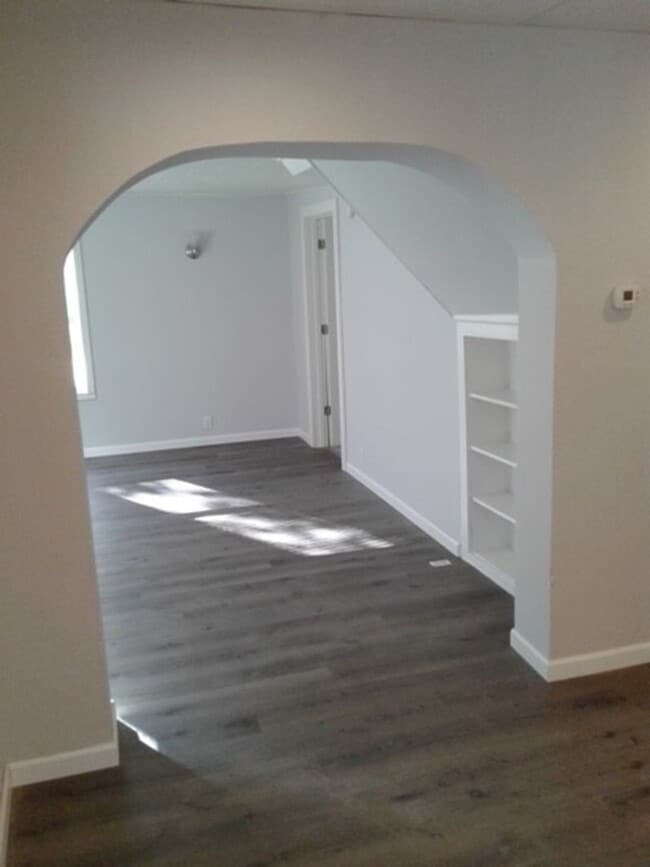 Building Photo - Beautiful 3 bed / 1 bath home on corner lot with attached garage in quiet Sparta neighborhood!