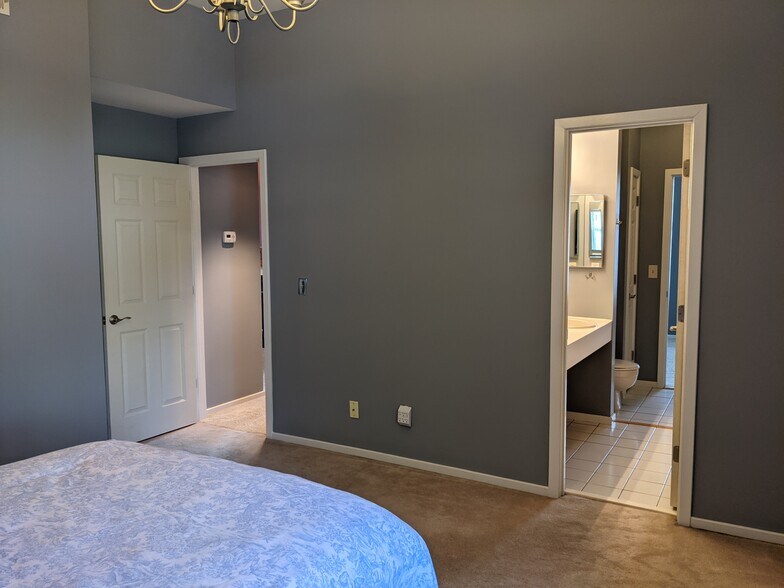 View from main room to living room and full bath - 4496 Maryland Ave