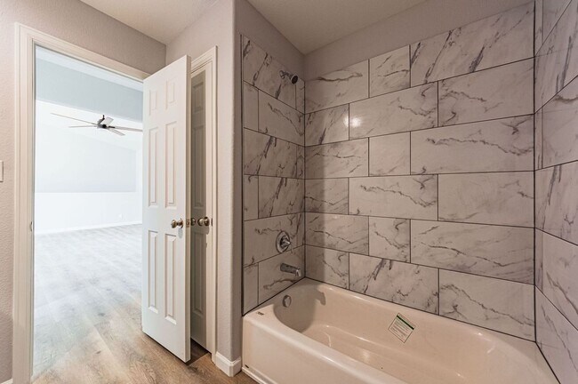 Building Photo - Move-In Special! FREE 50" TV for Qualified...
