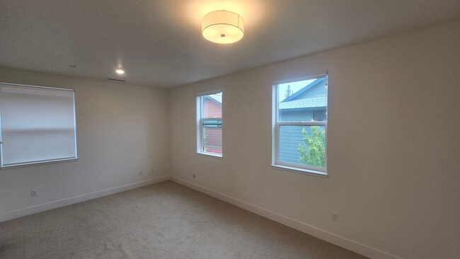 Building Photo - Newer 3-bedroom, two-story home located ju...