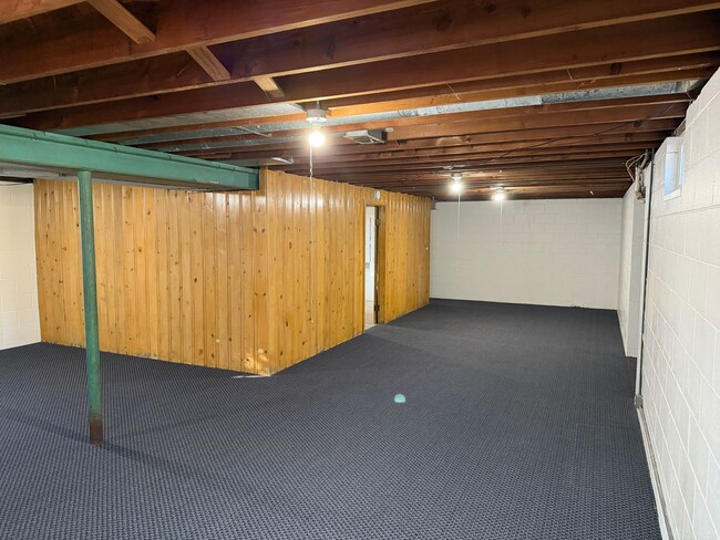 Building Photo - 3-Bedroom Home with Garage & Basement – Easy Access to Dodge St. | 1,040 SF