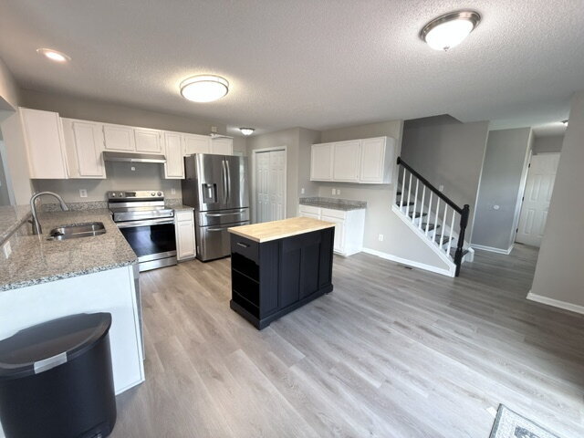 Building Photo - Spacious 4BR Home with Fenced Yard, Community Pool & 2-Car Garage