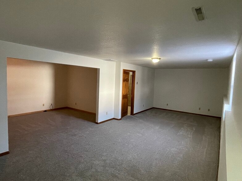 Basement bedroom (barn doors being installed) - 3015 Harmony Ln