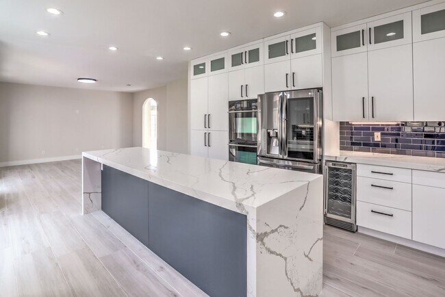 Building Photo - Luxury 5-Bedroom Home in Guard-Gated Community with 3-Car Garage