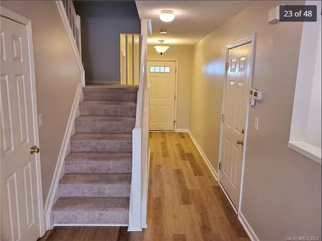Main Floor Hallway & Stairs - 9906 Birch Knoll Ct