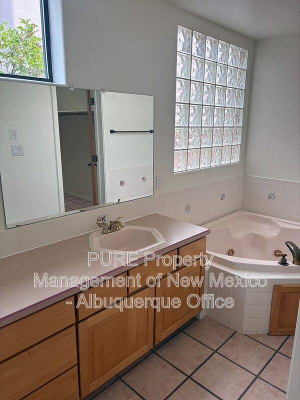 Building Photo - 8220 W Raintree Dr NE