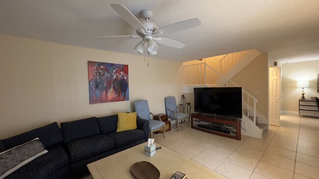 Building Photo - Spacious Wellington End-Unit Townhome | 2 Primary Suites | Screened Patio