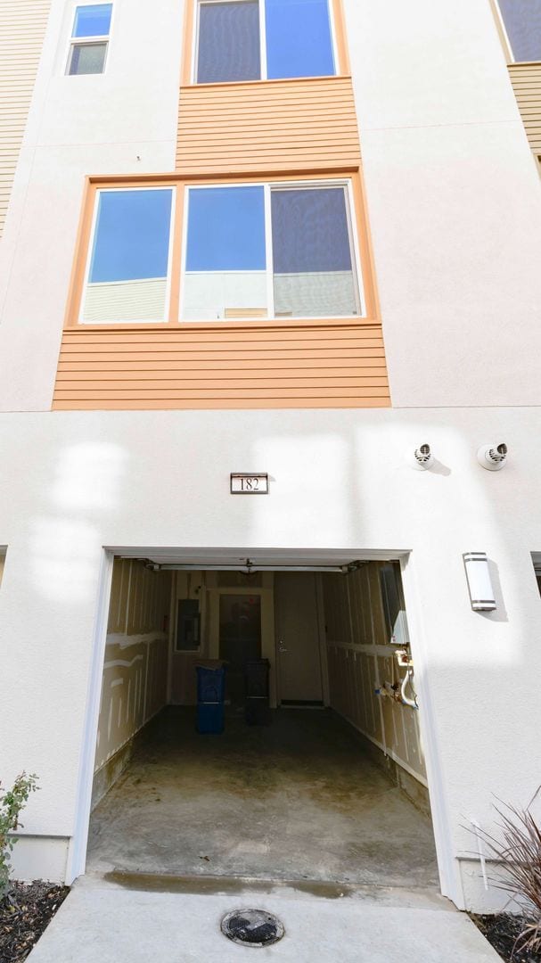 Building Photo - Experience contemporary urban living at its finest. Private Garage & Dual Suites!