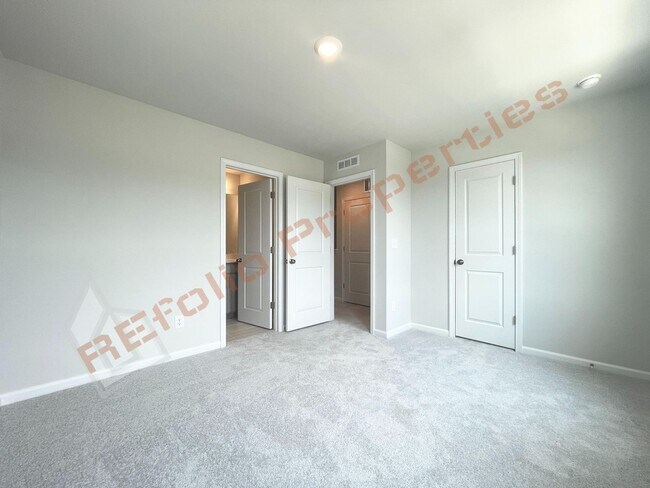 Building Photo - Brand-New 3BR/3.5BA Townhome w/ 1 Car Gara...