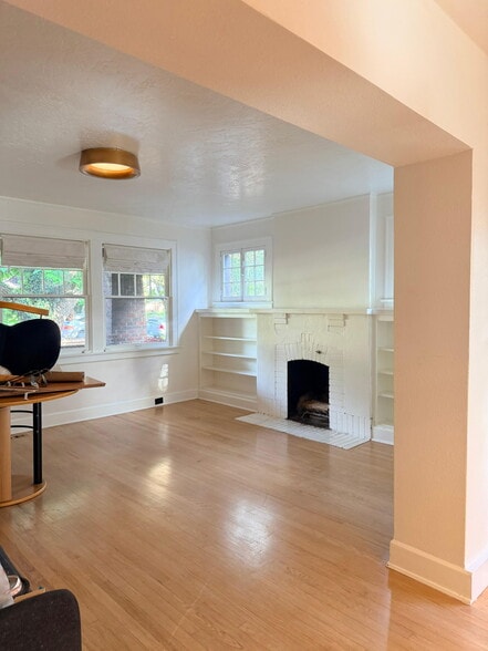 Cozy living room (fireplace is decorative only) - 1235 S University Blvd