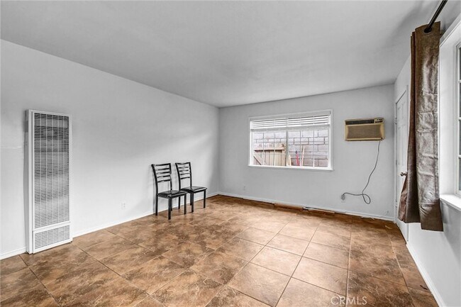 Building Photo - 9436 Ramona Ave