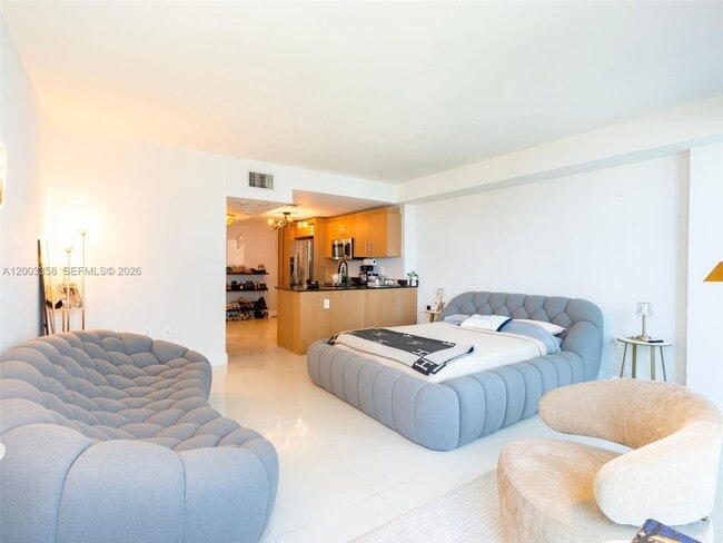 Building Photo - 10275 Collins Ave