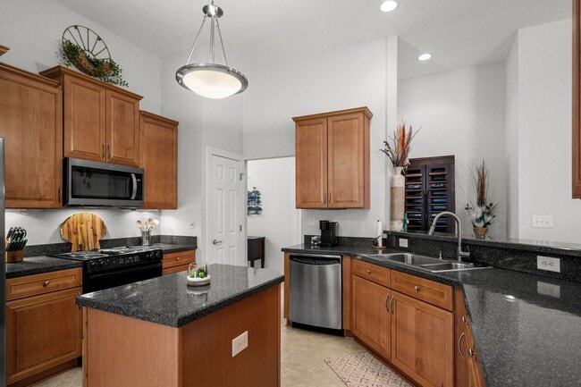 Building Photo - Live the Coastal Lifestyle in This Cypress Keys Beauty!