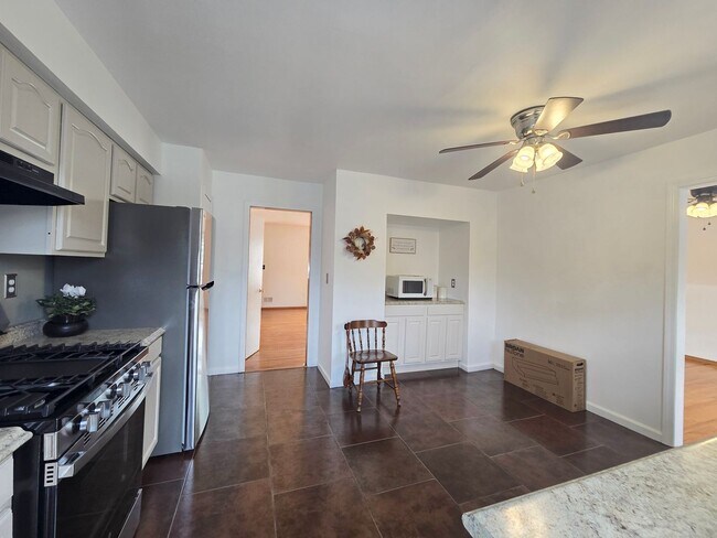 Building Photo - Updates abound at this SPACIOUS, half duplex with 3+ off-street parking spots, 3-bedrooms and 2 f...