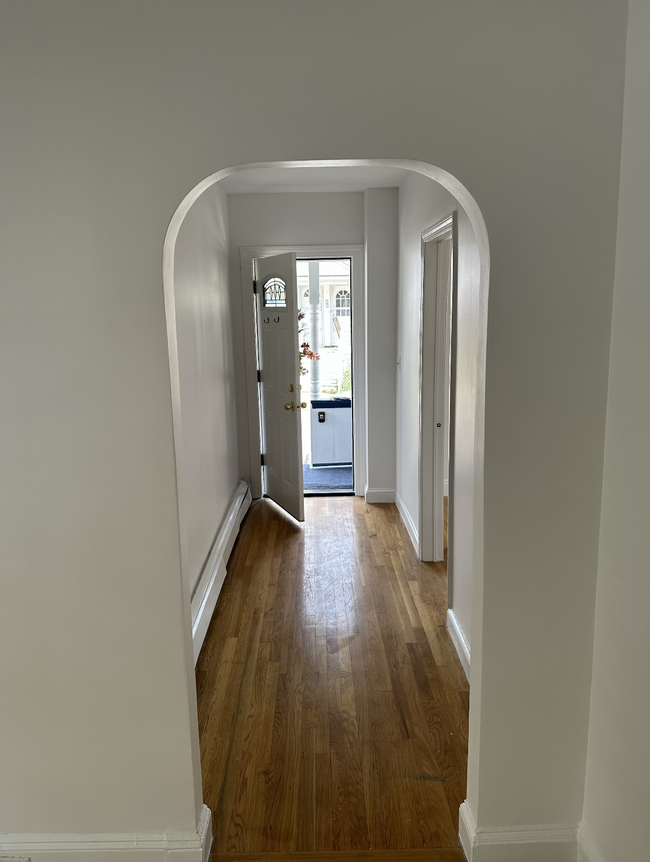 Charming arched entryway to front door/patio - 58 S Waverly St