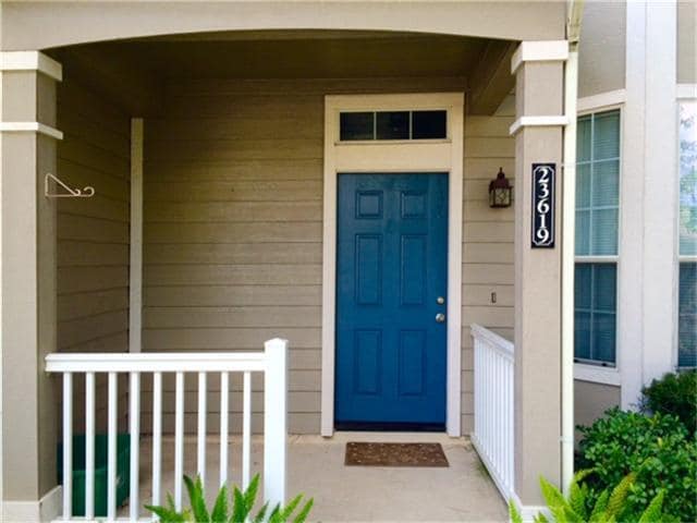 Charming front entry greets you and your guests. - 23619 Twisting Falls Drive