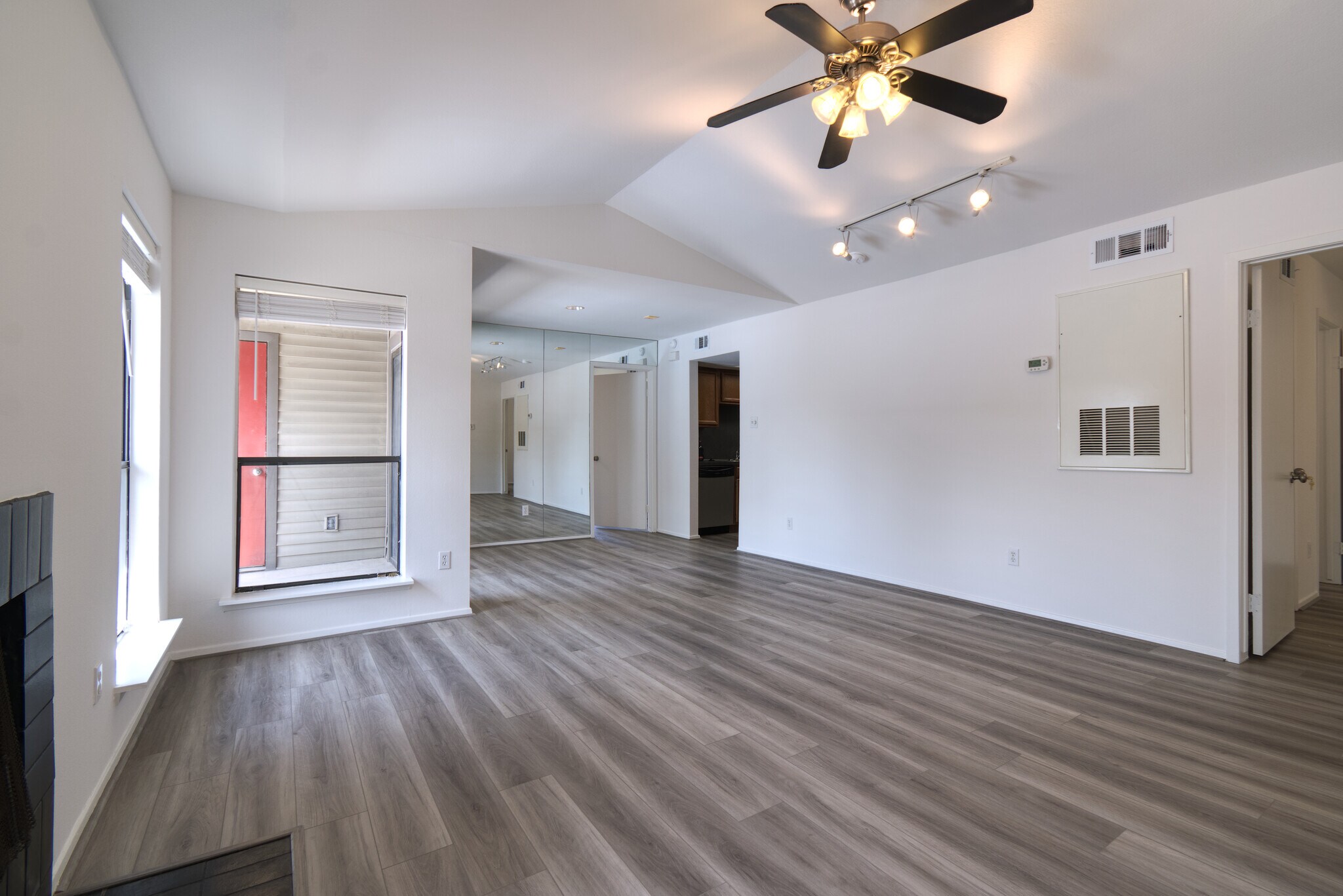 Living Room/Dining Room combo area seen from the Southwest corner. - 2025 Augusta Dr