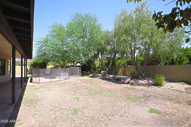 Building Photo - 10575 E Mission Ln