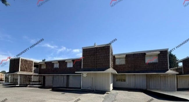 Building Photo - r144a Woodland Apartments
