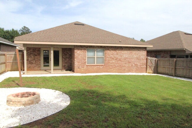 Building Photo - Beautiful 3BR/2BA Brick Home with Granite Kitchen, Covered Patio, Fire Pit & 2-Car Garage Near I-10