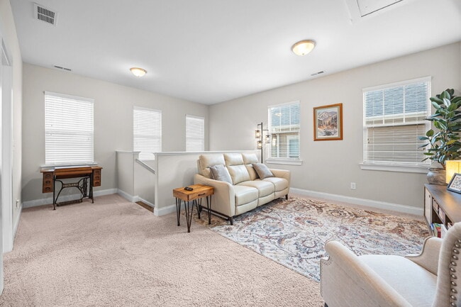 Building Photo - Fully Furnished 3BR Retreat in Riverwalk | Office + Screened Patio