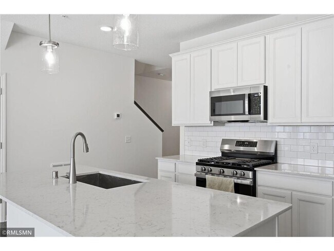 Building Photo - 9669 4th St Ln N