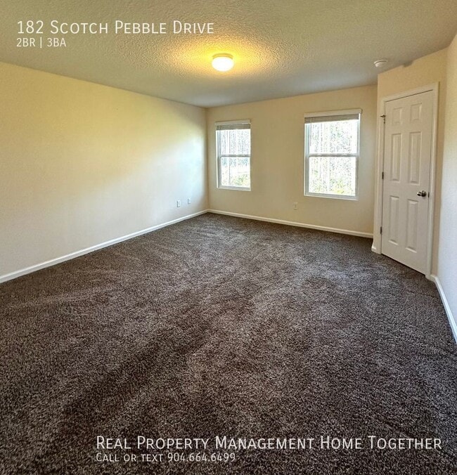 Building Photo - 2BR/2.5BA Like-New Peaceful Townhome