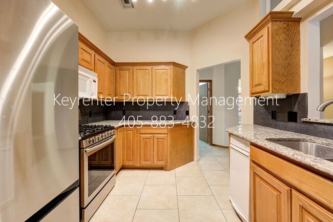 Building Photo - Amazing 4BD/3BTH home with a 3 car garage in the exclusive Cedar Pointe Gated Community!