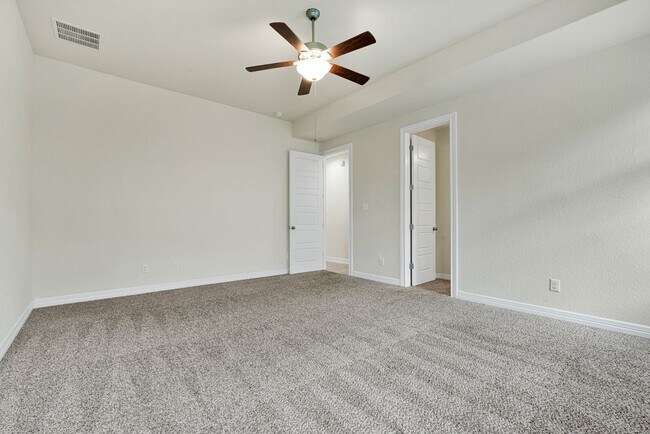 Building Photo - Spacious 5-Bedroom Beauty in Triana Neighborhood –  with Community Perks!