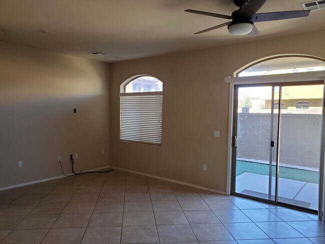 Great room with patio door to pet friendly backyard - 17150 N 23rd St