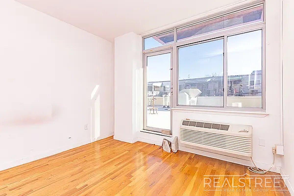 Building Photo - Massive Outdoor Patio | Spacious 3BR/2BA Apartment in Bushwick–East Williamsburg
