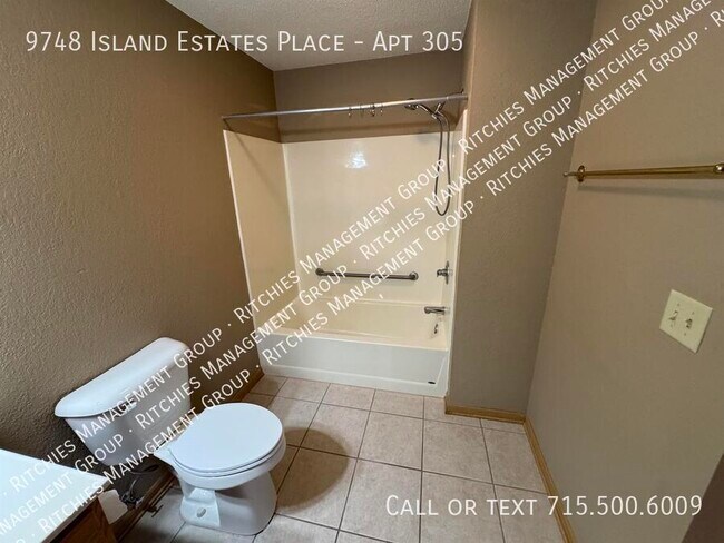 Building Photo - 9748 Island Estates Pl