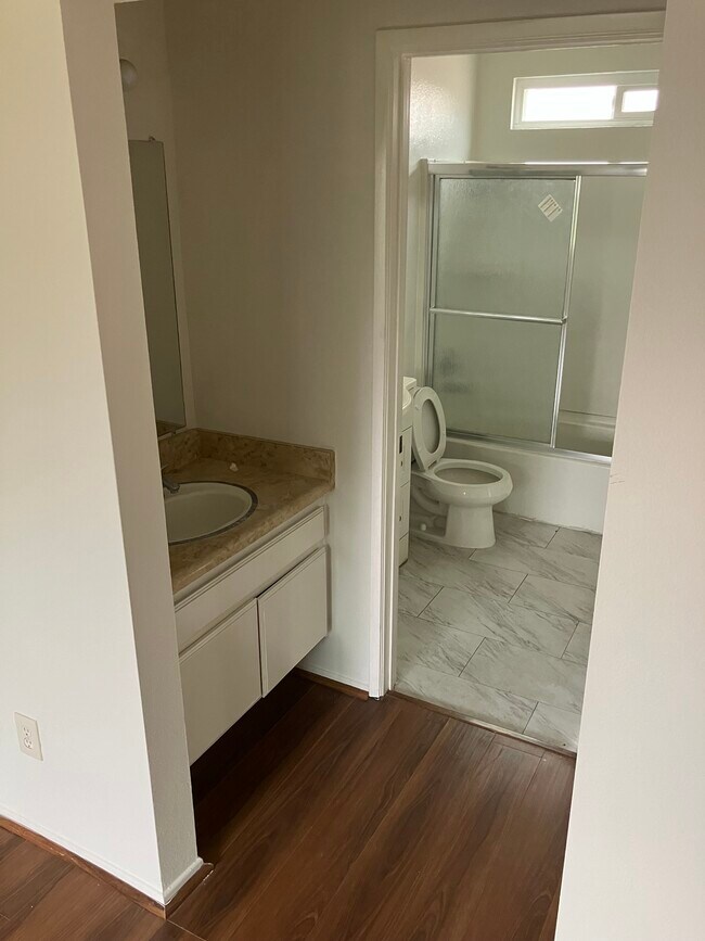 His/Her Vanities - 1236 E Broadway