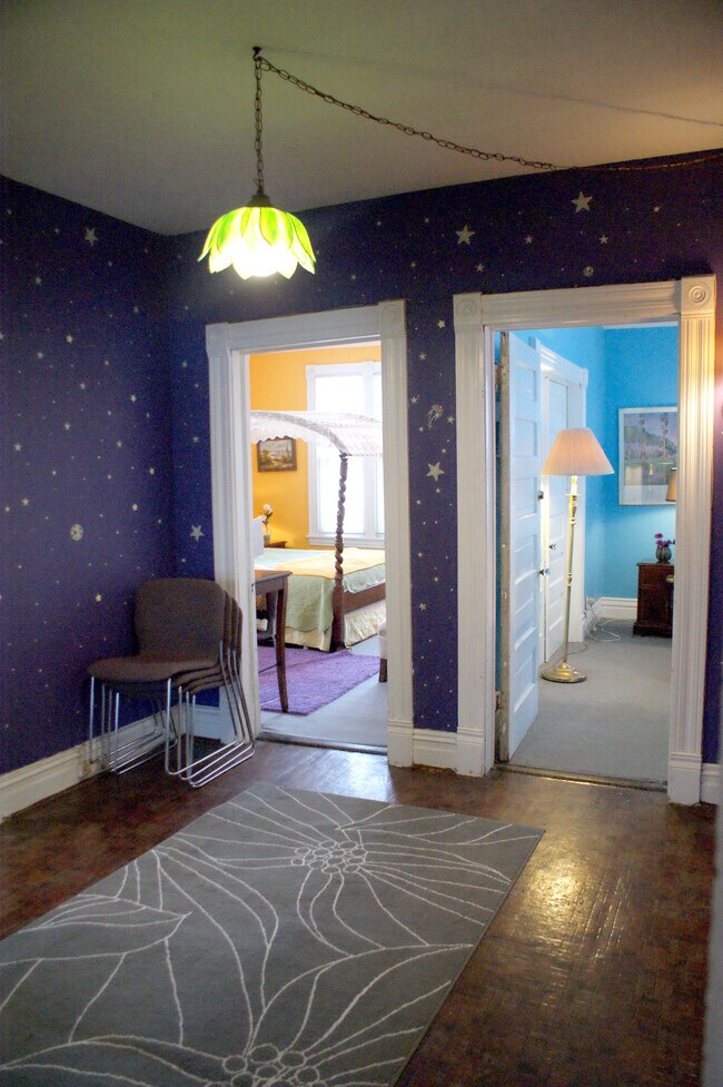 Common area leads to 3 bedrooms - 2425 DuPont Ave S